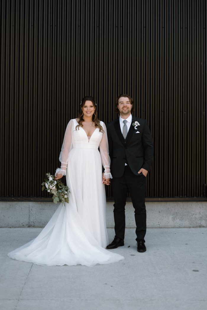 Bride In Bishop Sleeve Wedding Dress Called Joanne By Rebecca Ingram