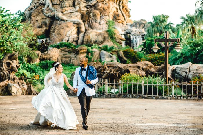 Real Couple Running Through Disney's Animal Kingdom Park After Getting Married