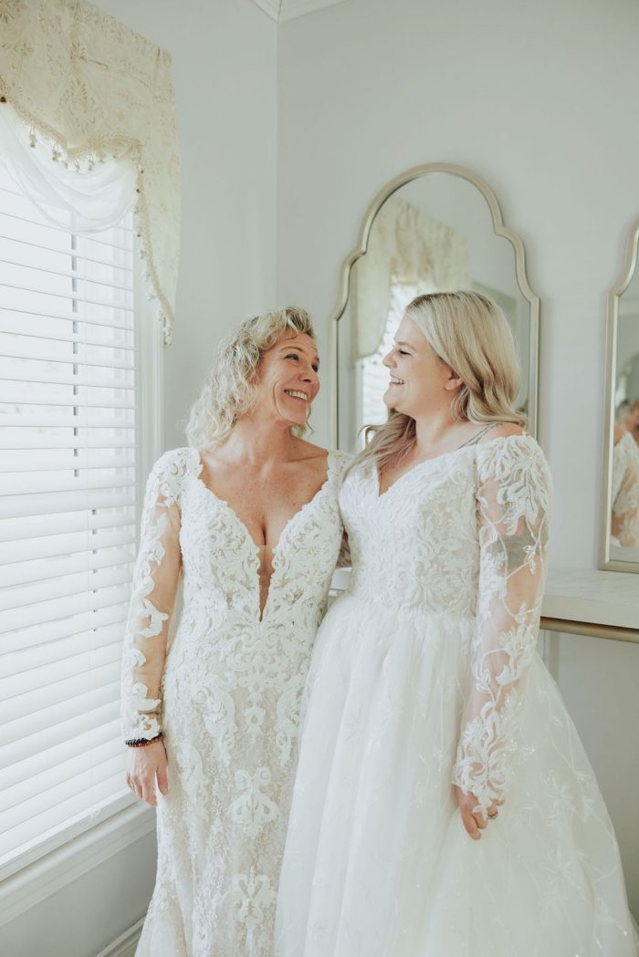 Brittany wearing one of Maggie Sottero's maternity wedding dresses and her mom