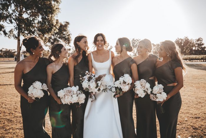 Bride in Satin Wedding Gown by Maggie Sottero with Bridesmaids Wearing Fern Green Bridesmaids Dresses