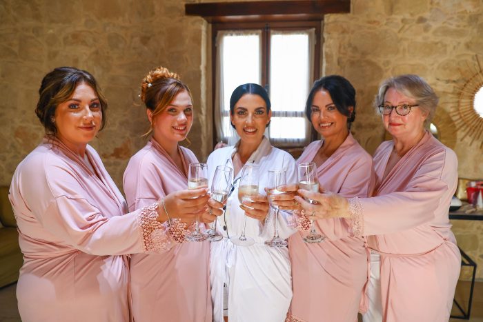 Alice getting ready with her bridesmaids
