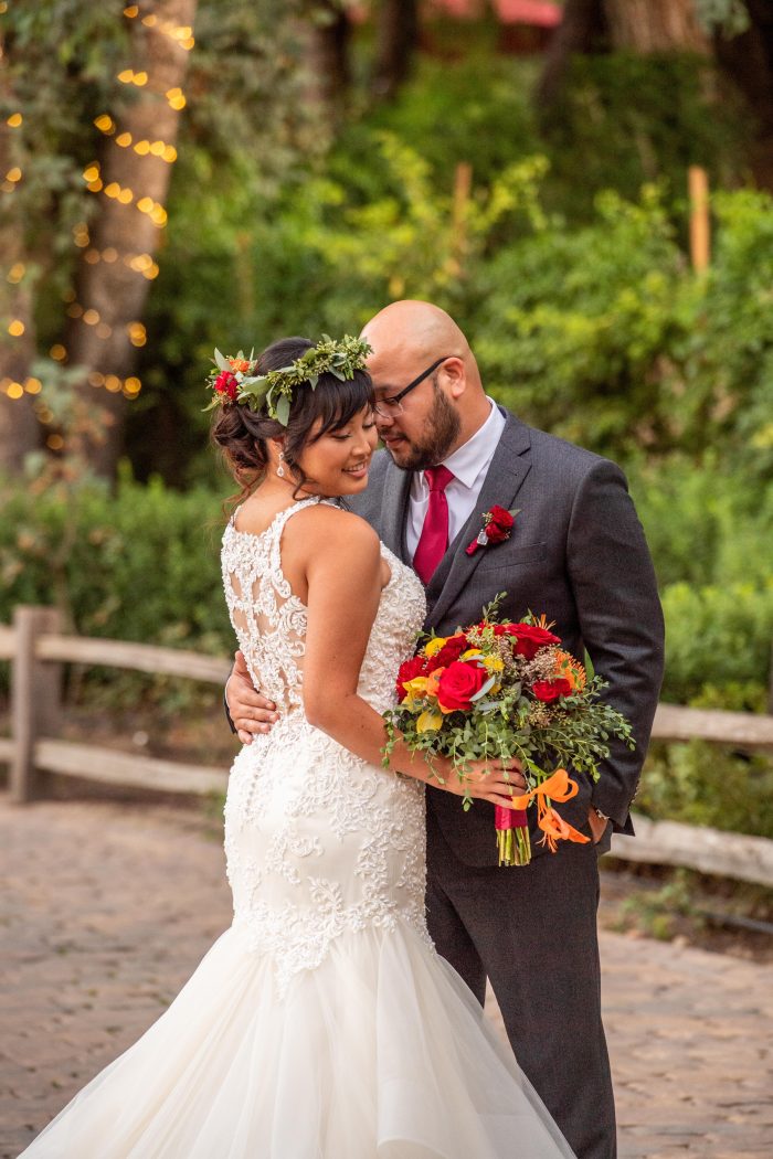 AAPI Bride Wearing A Sexy Wedding Dress Called Veda By Maggie Sottero Walking Down The Aisle