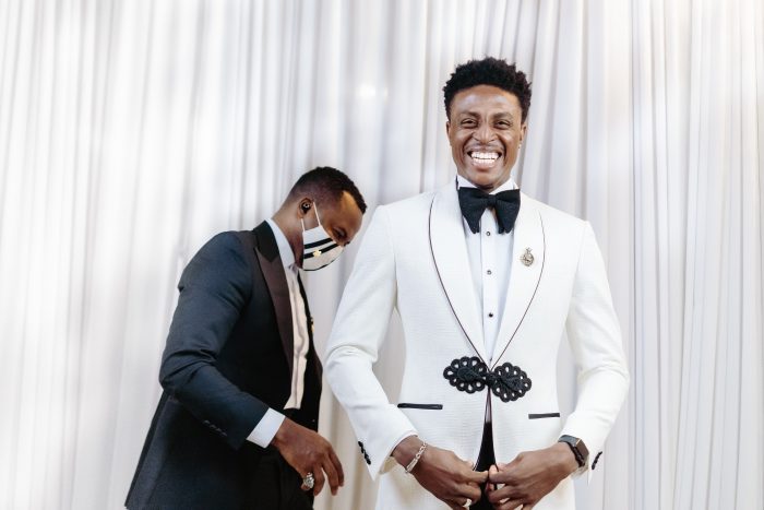 Groom Wearing a White Suit Designed by Stanlion