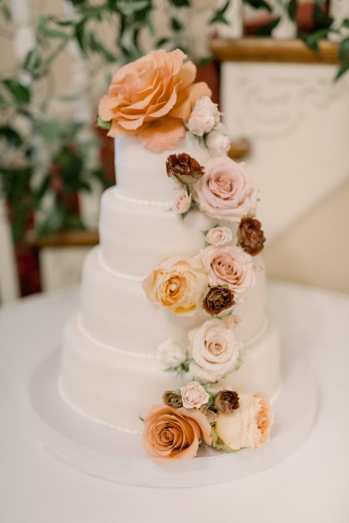 Wedding cake with Pantone Color of the Year 2024 florals