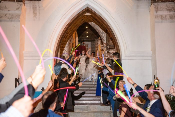 Pride Wedding Idea of Using Glow Sticks for Wedding Send Off