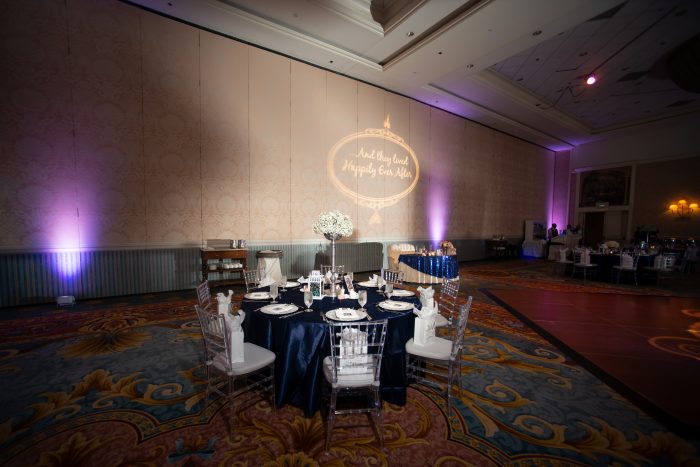 Party Favors and Disney Themed Dining Table at Fairytale Wedding Reception