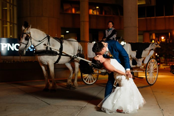 Bride wearing Hattie wedding gown by Rebecca Ingram, which goes well with winter wedding themes