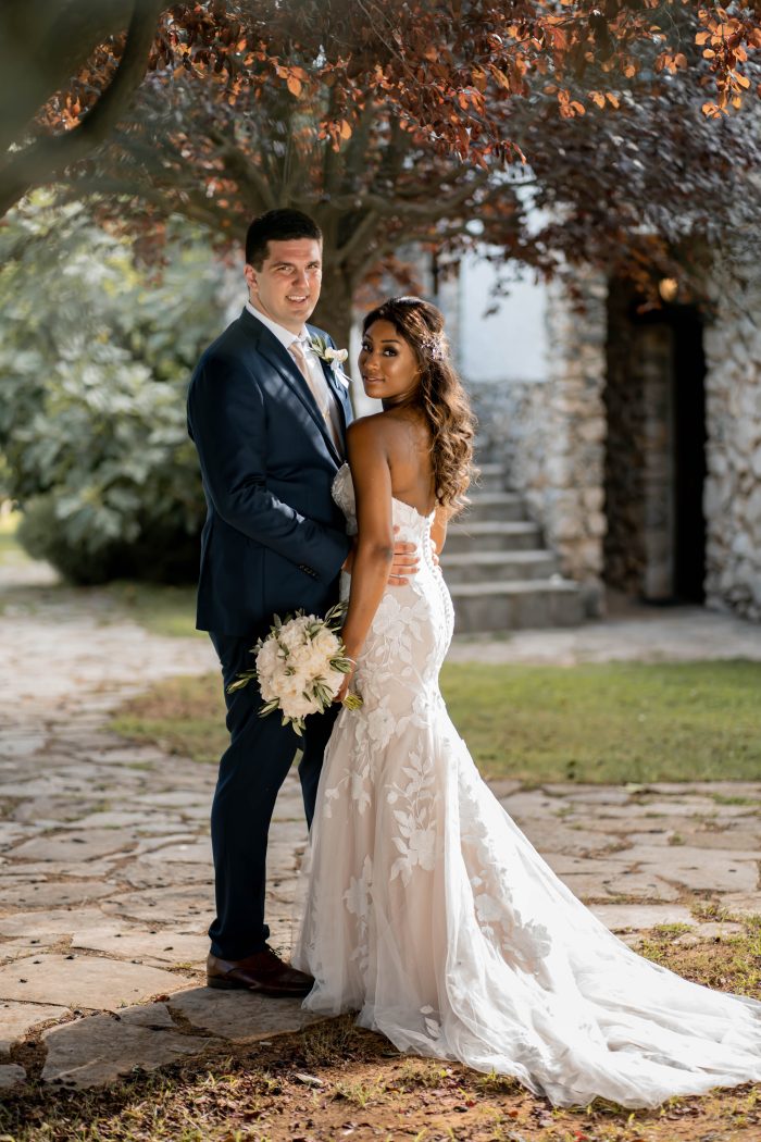 Bride wearing Hattie wedding dress by Rebecca Ingram