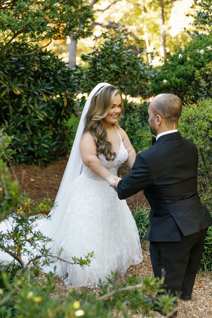 Sam and Lona, who is wearing one of Sottero and Midgley's A-line wedding dresses, Marvine