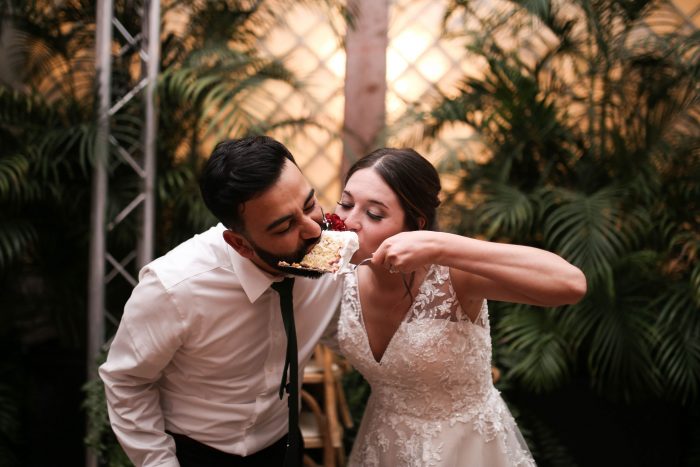 Real Bride and Groom Eating Tres Leches Cake
