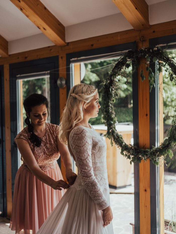 Deirdre Wedding Dress by Maggie Sottero being laced up