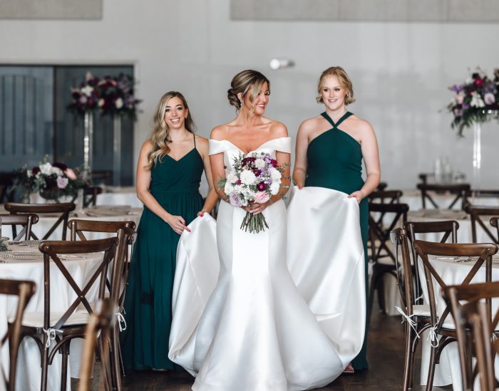 Bride wearing Josie wedding gown by Rebecca Ingram, which works wonderfully for winter wedding themes
