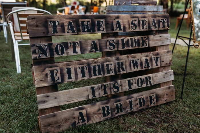 Sign at LGBTQ Wedding That Says Take a Seat Not a Side
