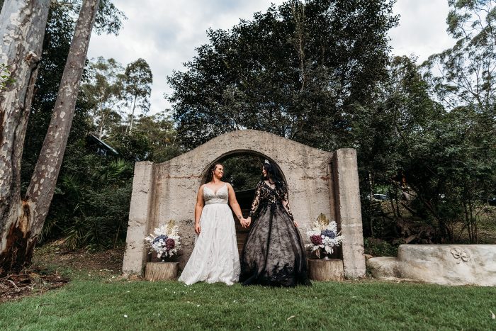 LGBTQ Brides at Vintage Fairytale Wedding Wearing Maggie Sottero Wedding Dresses
