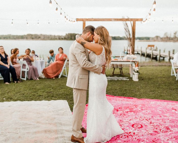 Groom Dancing with Real Bride Wearing Beaded Sheath Wedding Dress Called Elaine by Maggie Sottero