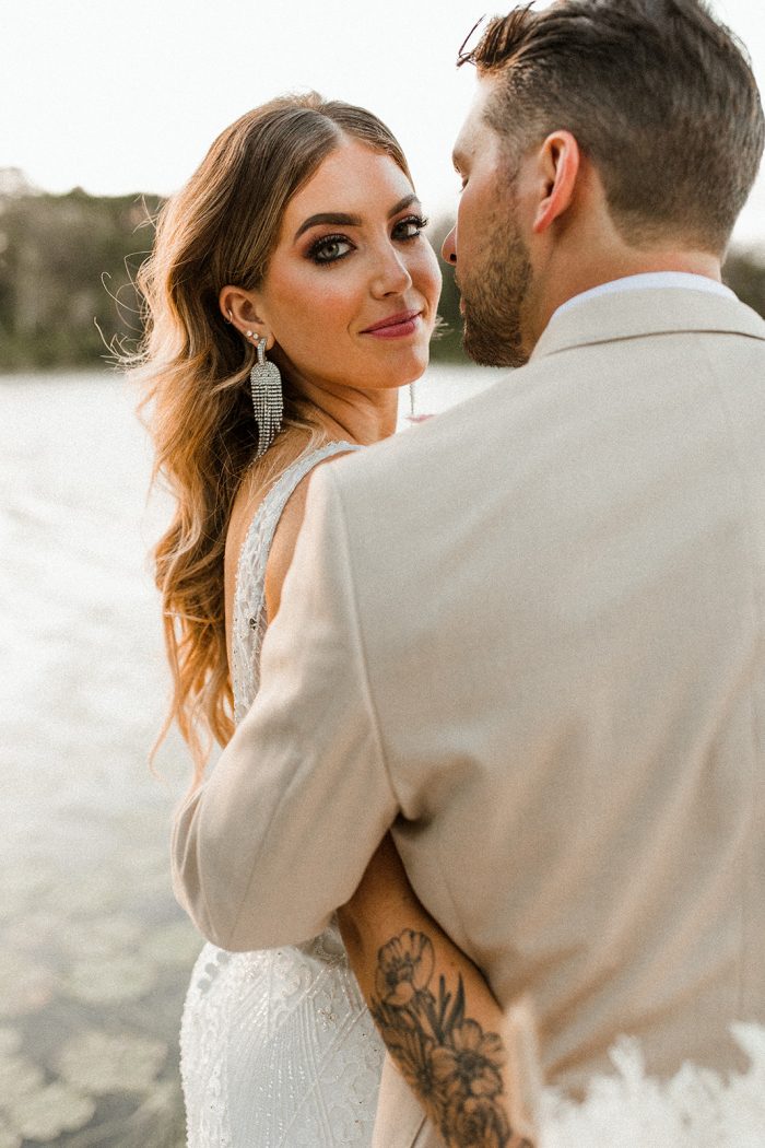 Bride Wearing Modern Wedding Makeup at Intimate Lakeside Wedding