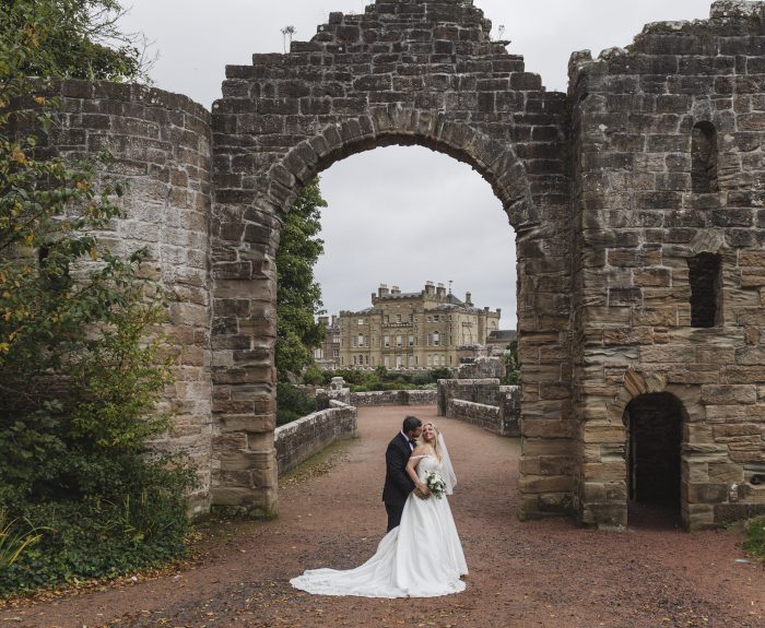 Bride wearing Kimora wedding dress by Sottero and Midgley to her destination wedding