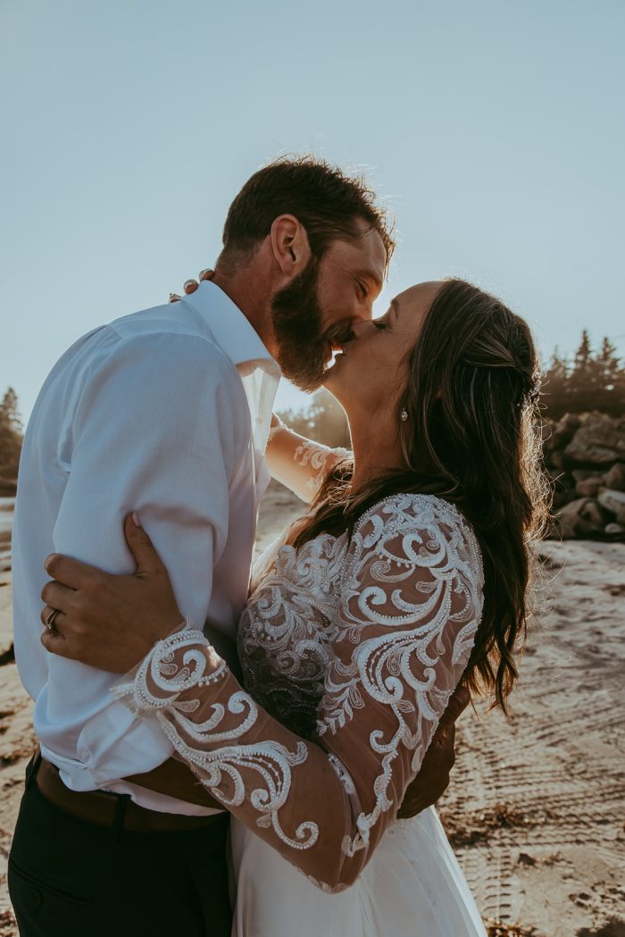 Bride wearing Lorraine Dawn wedding dress by Rebecca Ingram
