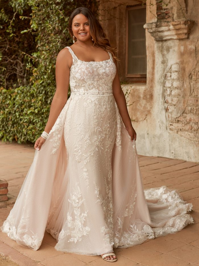 Wedding Dress Styles For Body Types For Brides With Pear Body Shapes With Bride Wearing A Gown With An Overskirt Called Albany By Maggie Sottero