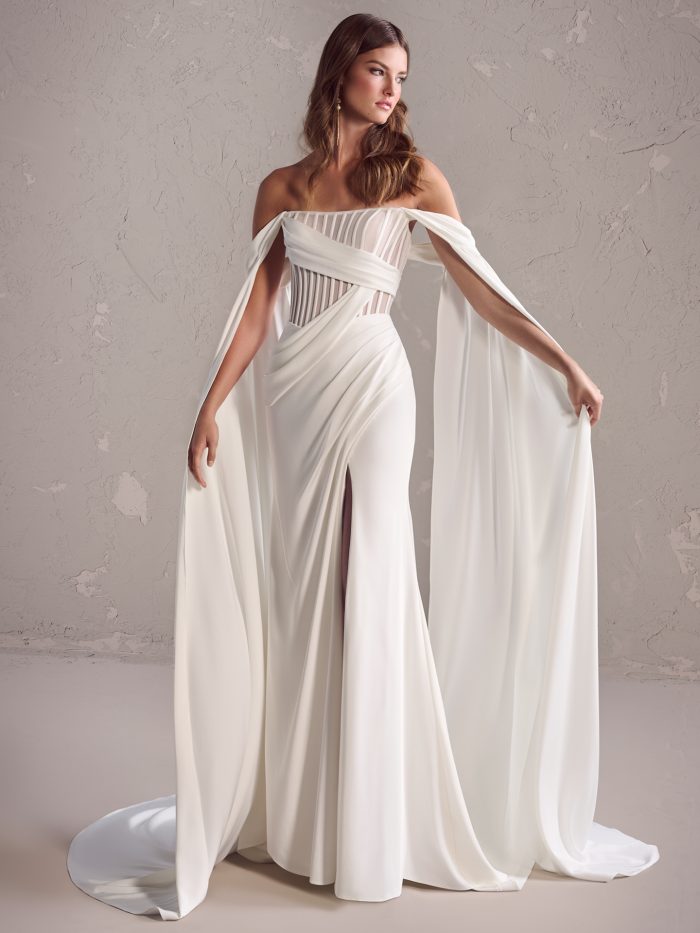 Bride wearing a Grecian-inspired crepe wedding dress