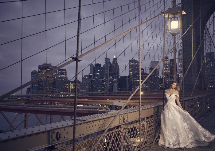 Bride In Floral Off-The-Shoulder Wedding Dress Called Leandra By Maggie Sottero