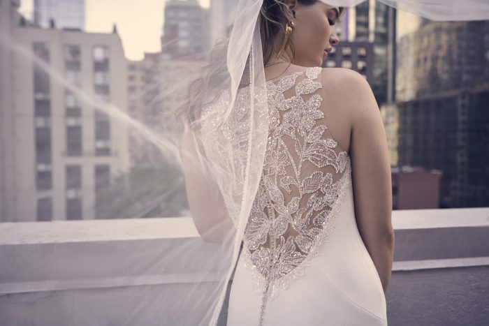 Bride In Beaded Crepe Wedding Dress Called Noah By Maggie Sottero
