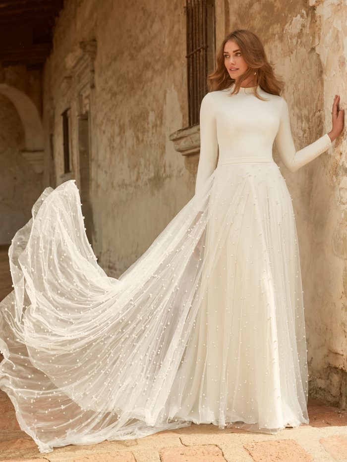 Wedding Dress Trends With Bride Wearing A High Neck Dress Called Sahar By Maggie Sottero