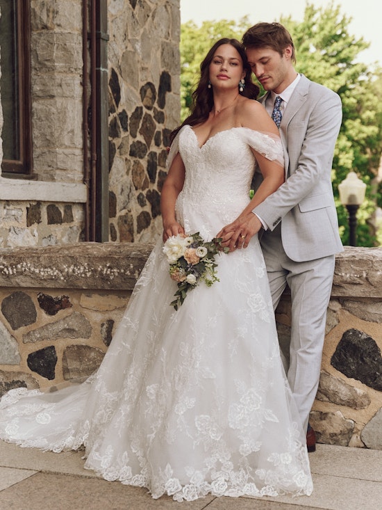 Bride wearing pearl wedding dress called Skylar by Maggie Sottero