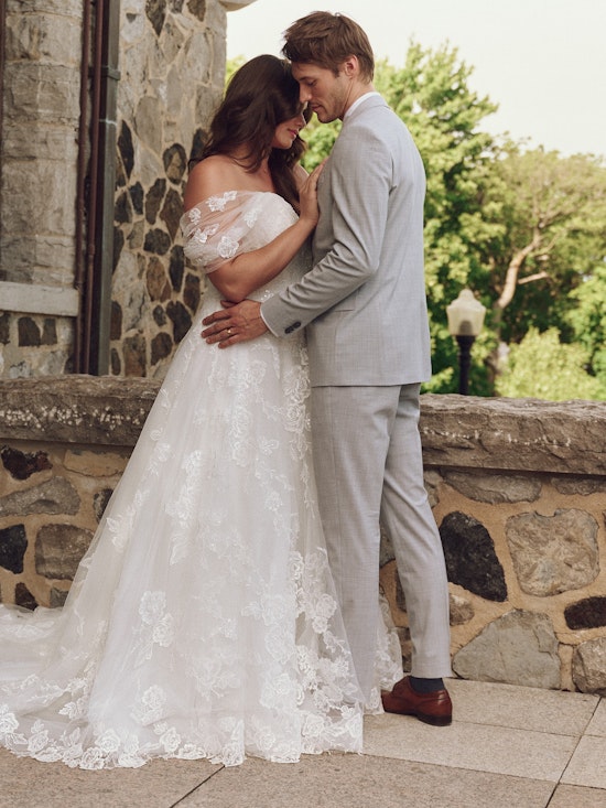 Bride wearing pearl wedding dress called Skylar by Maggie Sottero