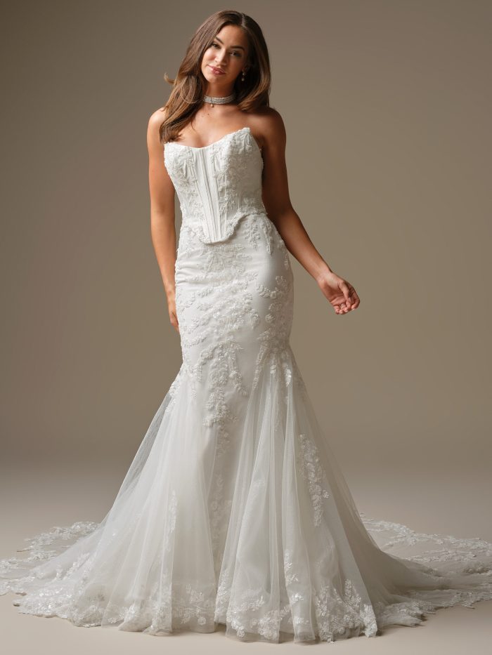 Wyntelle by Maggie Sottero strapless fit and flare wedding dress with mock two piece corset bodice and lace tulle skirt