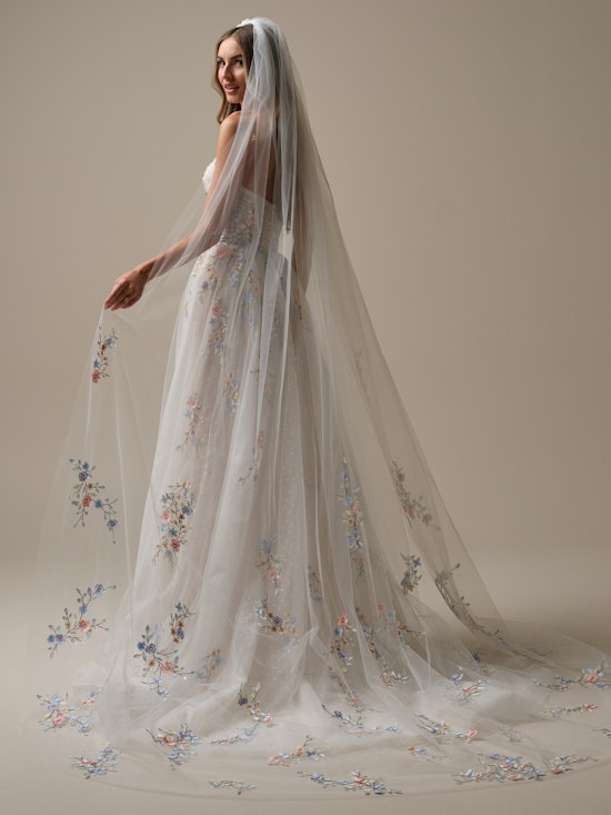 Bride wearing bridal accessories Zephyrine Veil