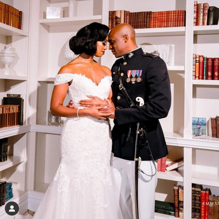 Bride and Groom holding each other with Bride wearing Florina lace mermaid gown by Rebecca Ingram
