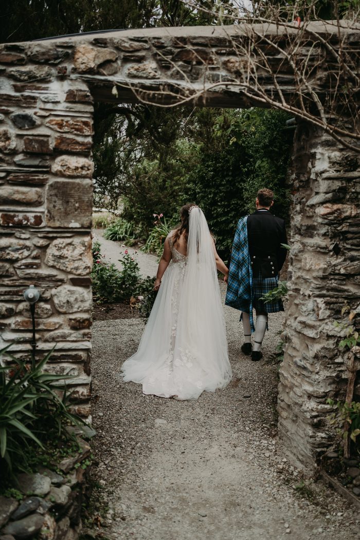 Bride In A-Line Wedding Dress Called Minerva With Updo Wedding Hairstyle