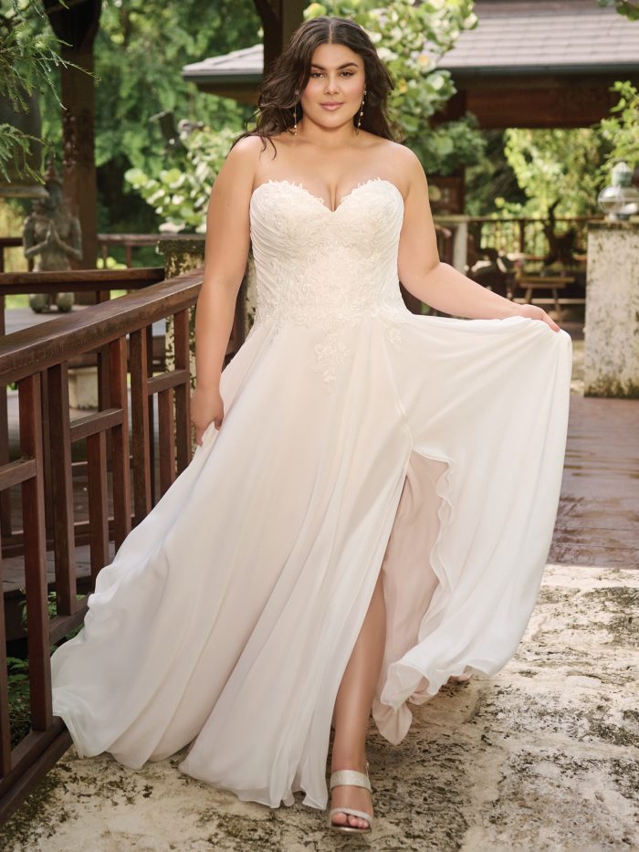 Bride wearing A-line wedding dress Dagney by Rebecca Ingram