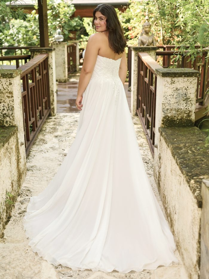 Bride wearing A-line wedding dress Dagney by Rebecca Ingram