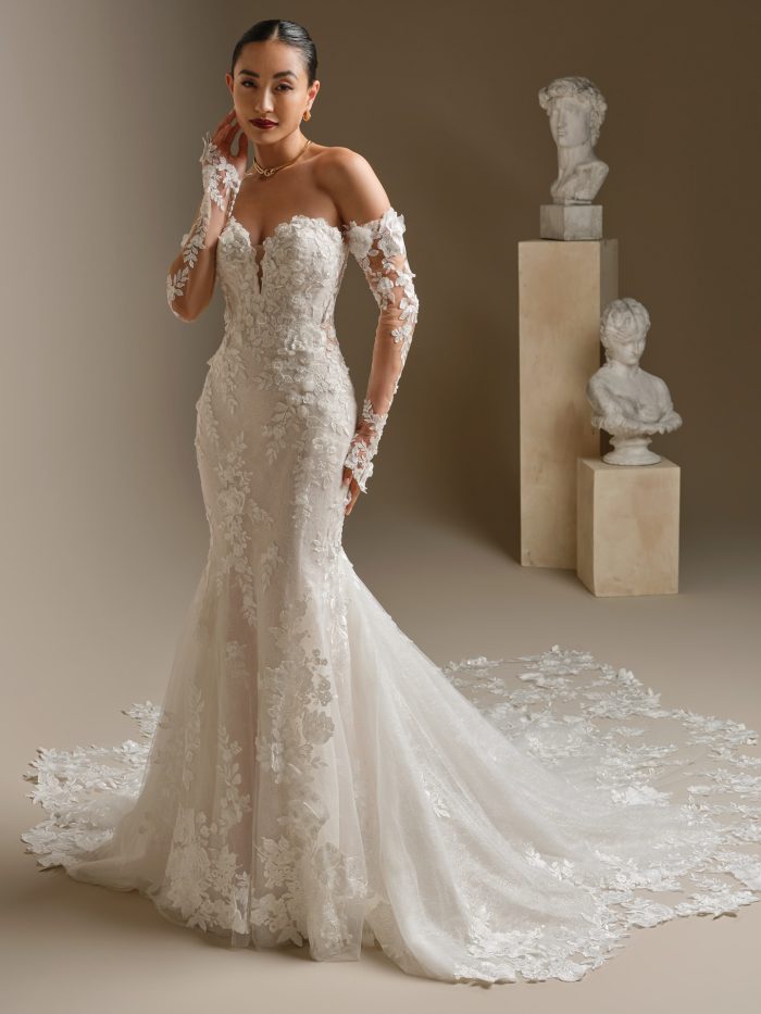 Sottero and Midgley Rashida fit-and-flare wedding dress featuring a strapless illusion lace bodice, off-the-shoulder floral lace sleeves, and a fitted silhouette with a lace-accented train.