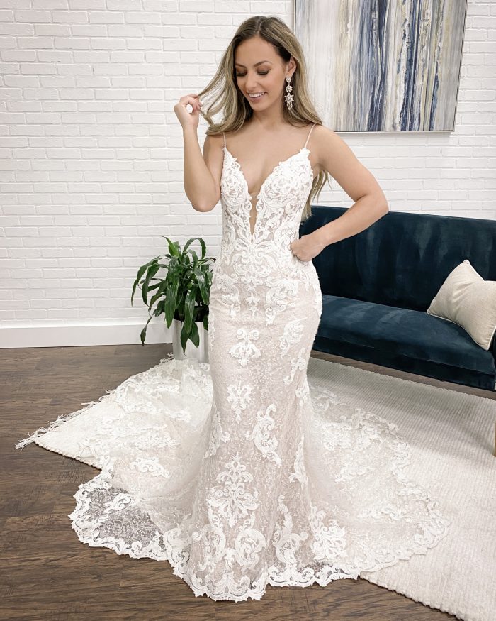 Bride at Wedding Dress Fitting Trying on Sheath Wedding Dress Called Tuscany Royale by Maggie Sottero