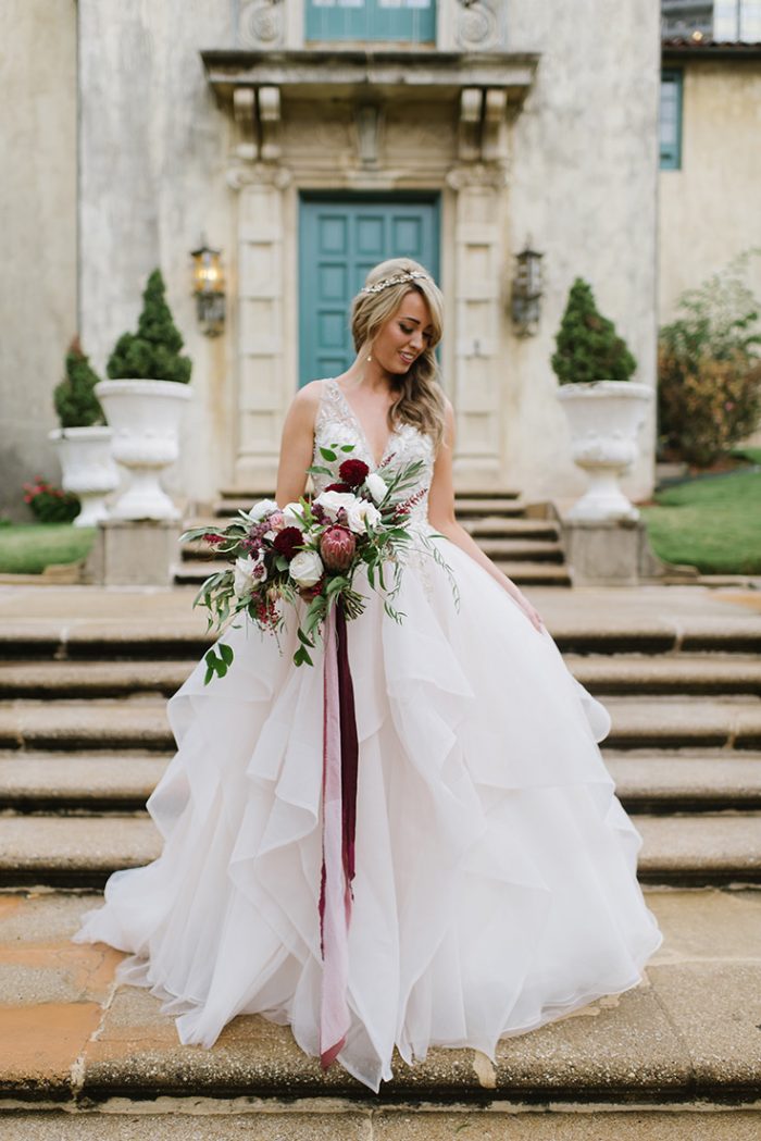 Real Bride Wearing V-neck Ball Gown Wedding Dress Called Amelie by Sottero and Midgley