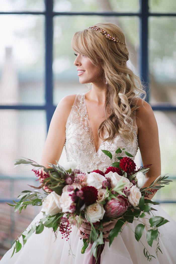 Bride Wearing Champagne Ball Gown with Bouquet