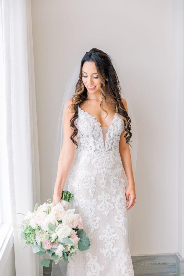 Model Wearing Lace Wedding Gown with Sheer Bodice Called Tuscany Lynette by Maggie Sottero
