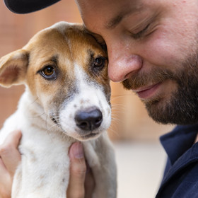 Man with a puppy