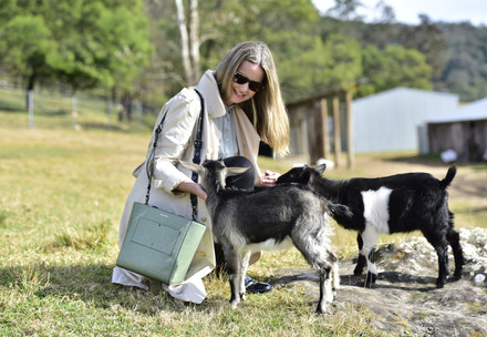 Woman with goats