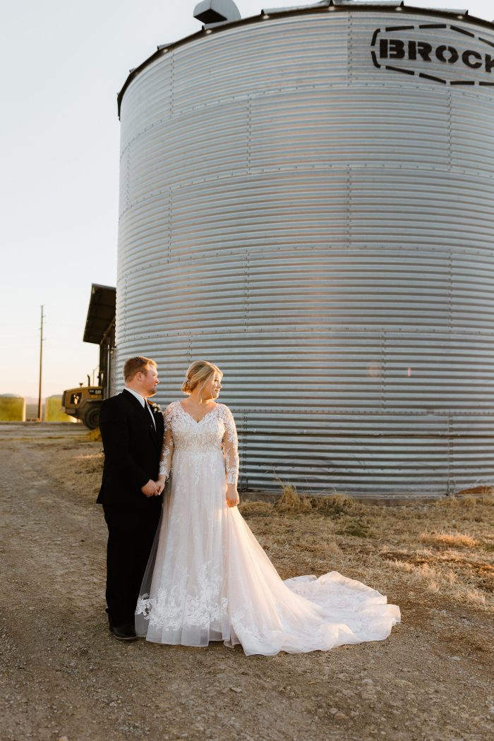Bride In Long Sleeve Wedding Dress Called Zander By Sottero And Midgley