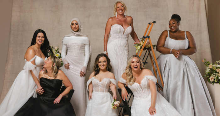 Seven brides in a variety of wedding dresses