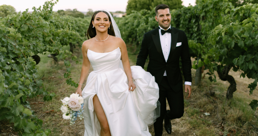 Bride wearing wedding dress by Maggie Sottero with bridal accessories