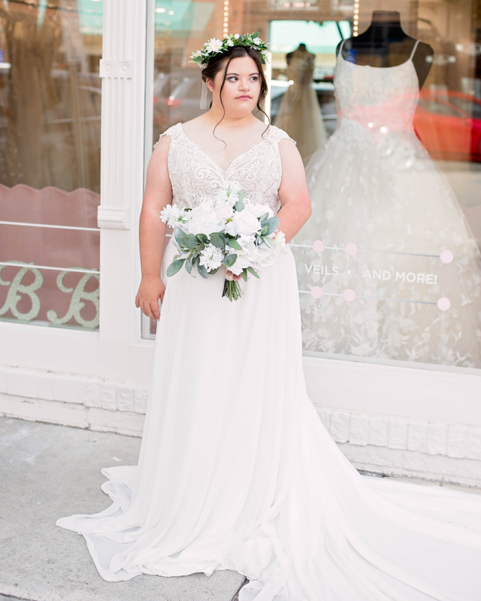 Bride wearing June bridal gown