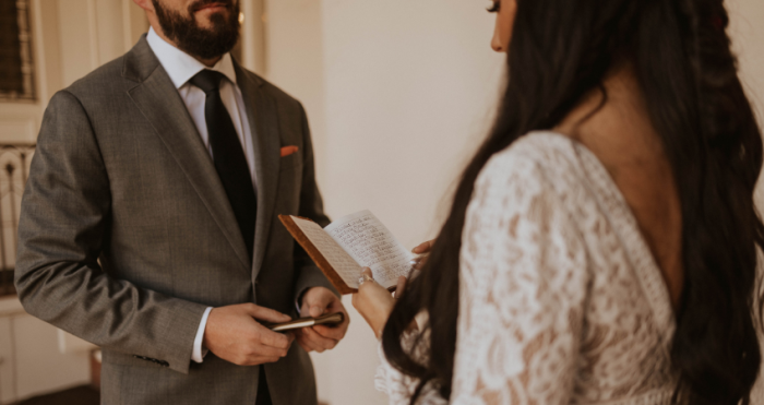 Bride Reading Vows to Husband